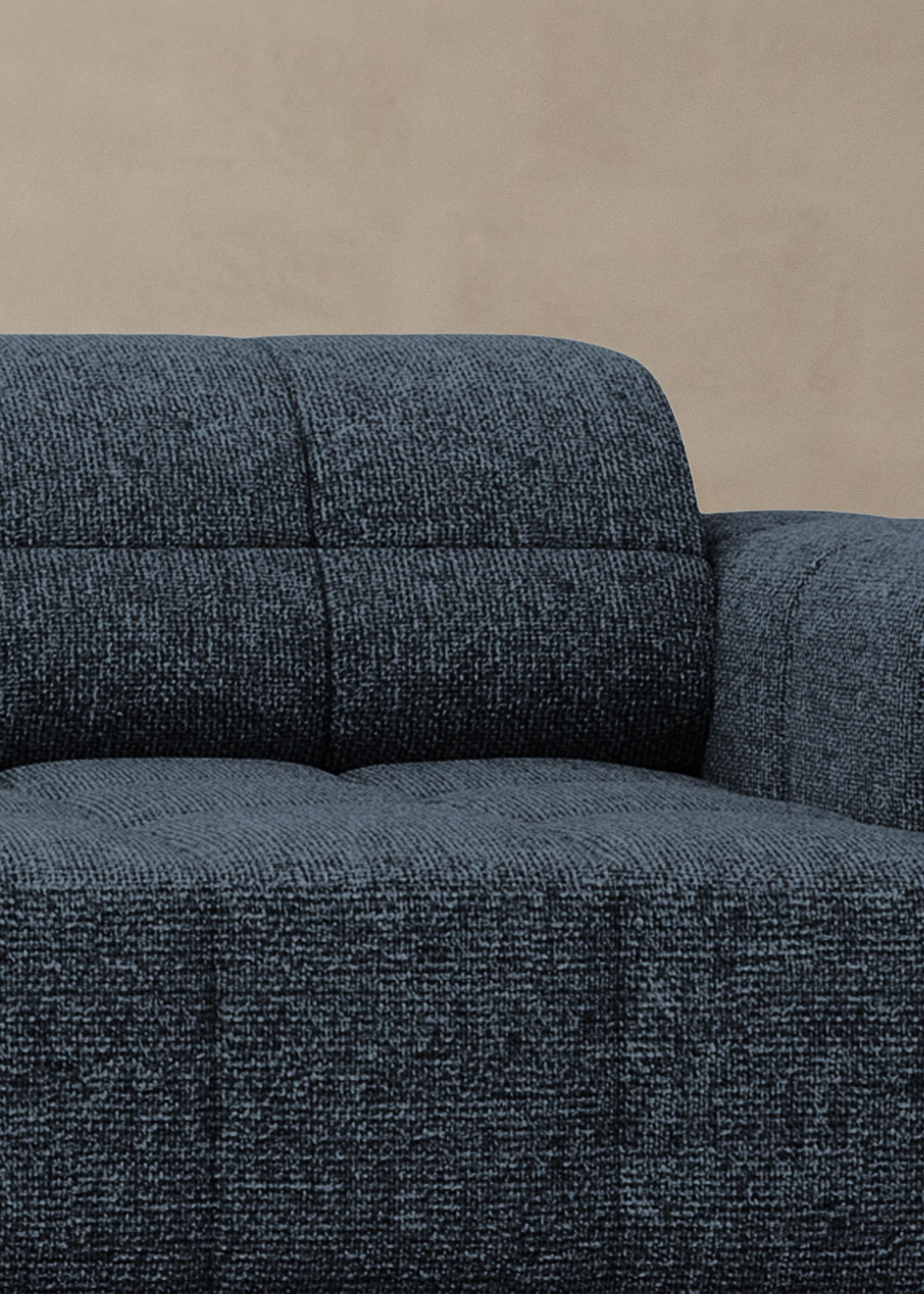 Close-up of Jennifer sofa in dark textured fabric with square stitching and deep seat – Micadoni furniture