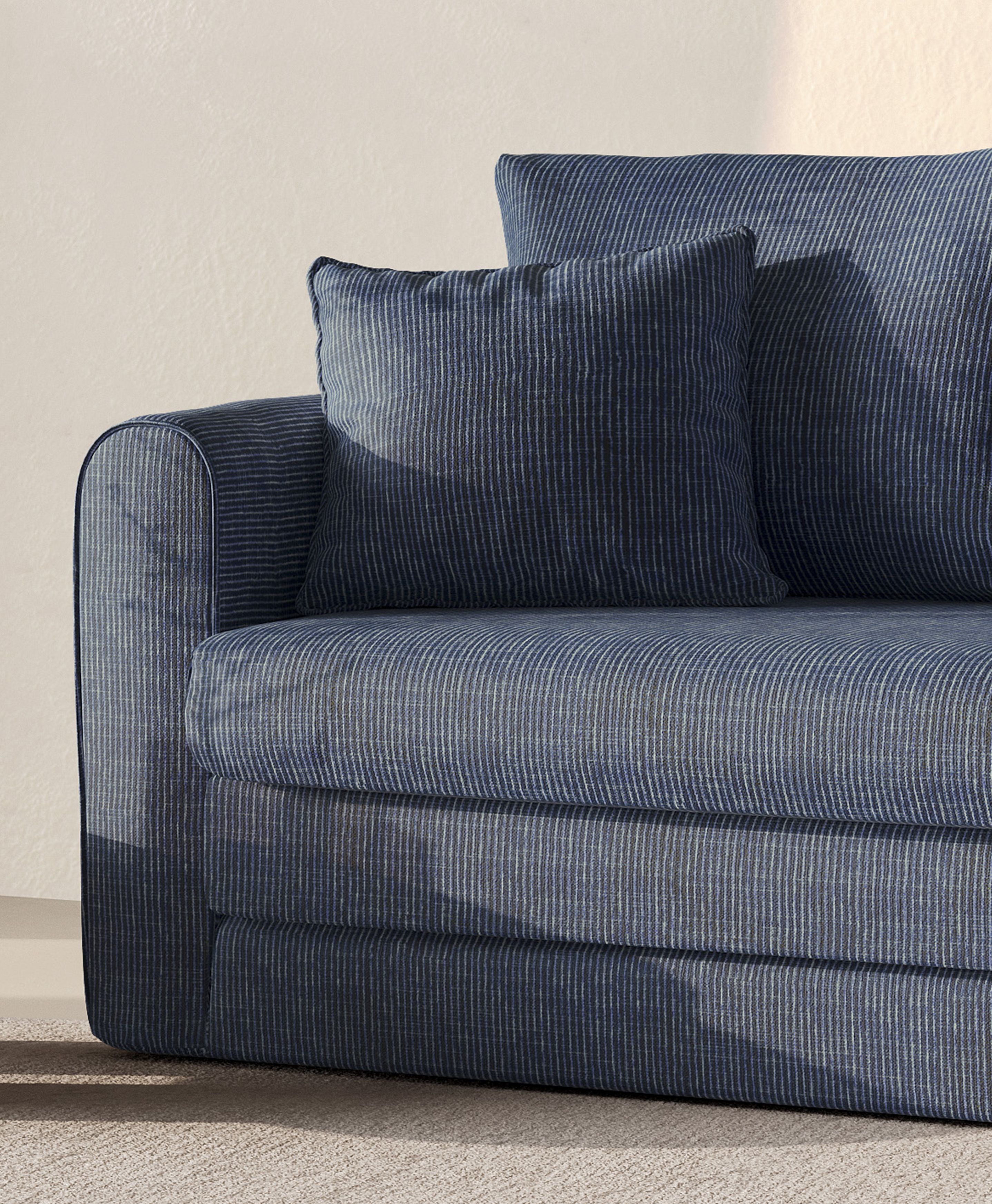 Canapé-lit Lido en tissu rayé bleu avec forme compacte et coussins moelleux – mobilier Micadoni