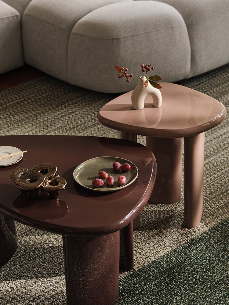 Lawrance coffee tables in glossy brown and blush pink finish.