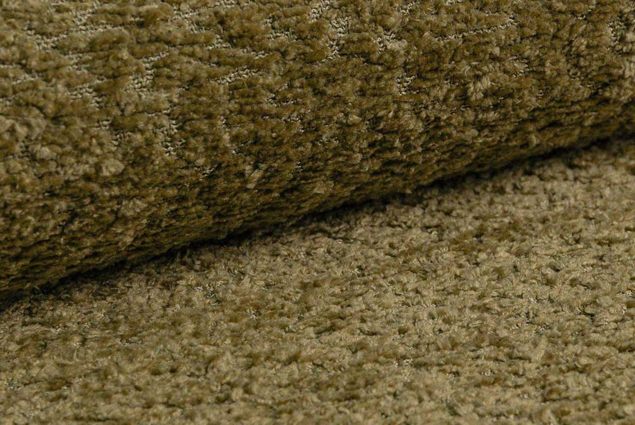 Close-up of green textured fabric for upholstery – Micadoni